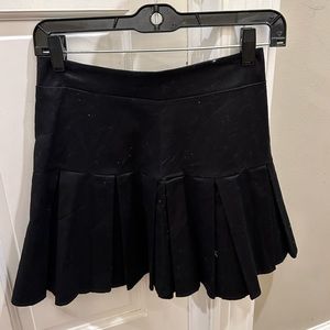 Black Tilly’s pleated skirt
